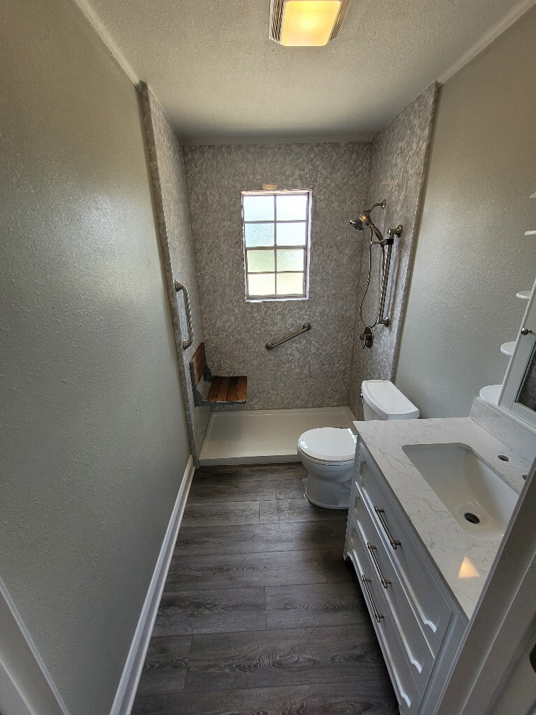 photo of a small gray bathroom