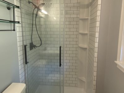 Photo of Newly Renovated Small Bathroom by The Show Company
